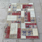 Red 2' x 3' vintage patchwork rug with patchwork design, handmade in Turkey – Deacon.