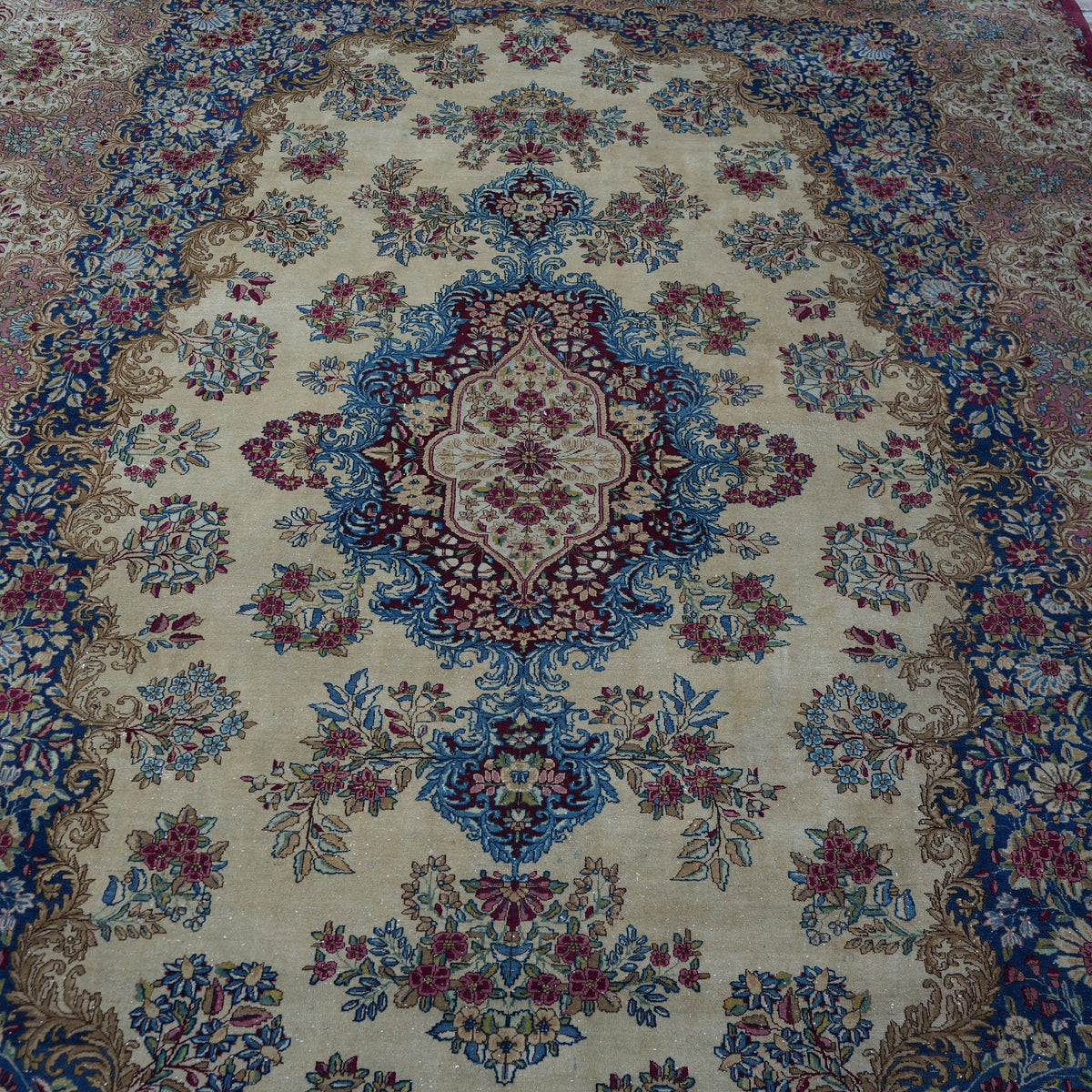 Close-up of the colorful vintage persian rug showing traditional details, hand-knotted weave, wool and cotton and low pile.