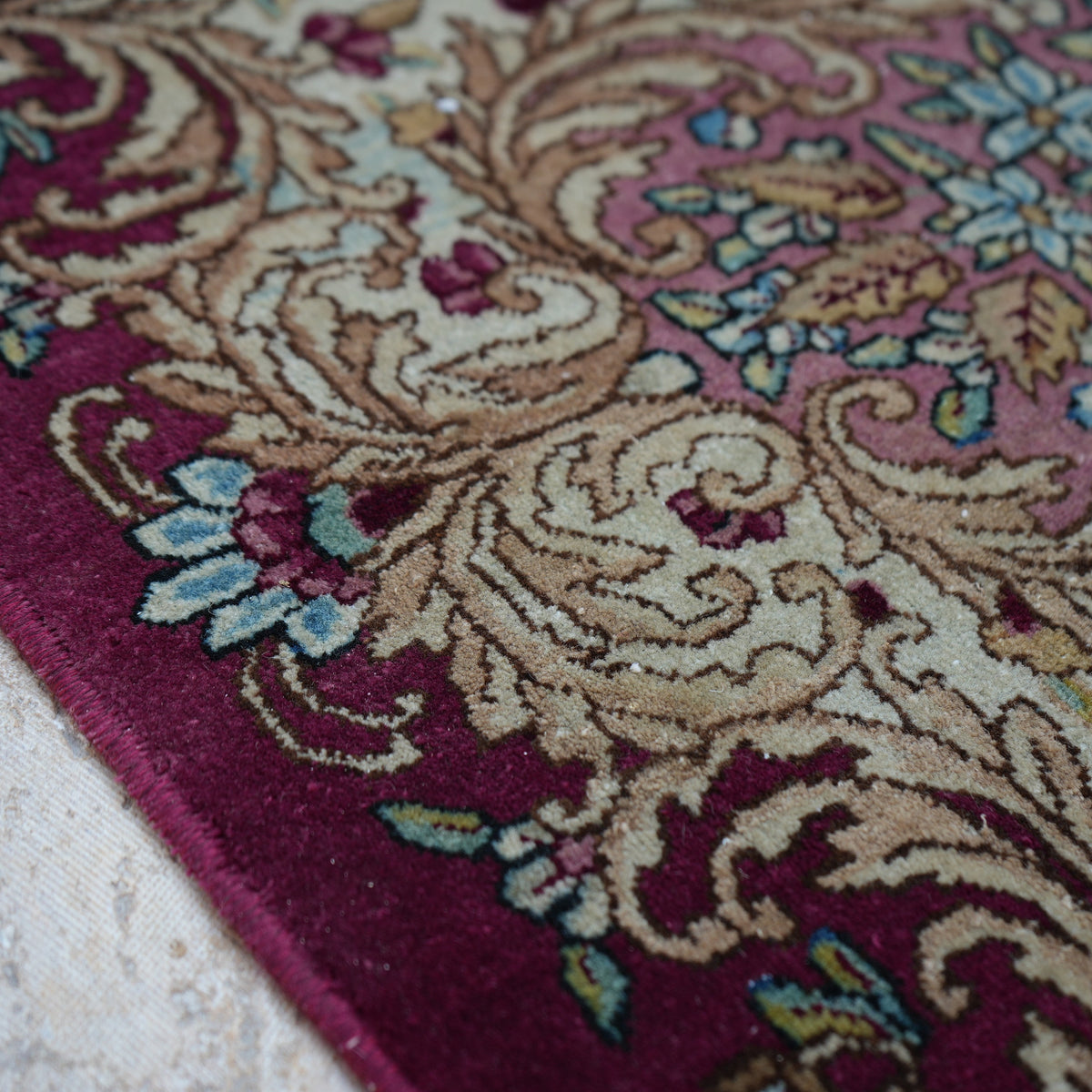 1970s colorful vintage persian rug with traditional design, hand-knotted weave and low pile.