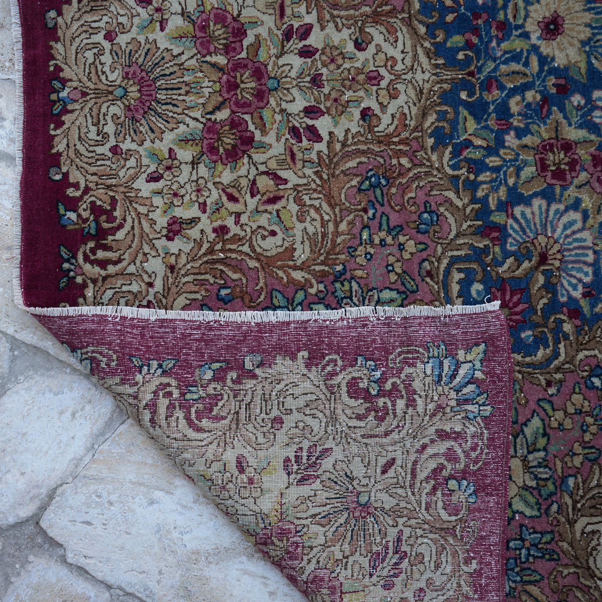 Additional view of the colorful vintage persian rug, hand-knotted in wool and cotton.