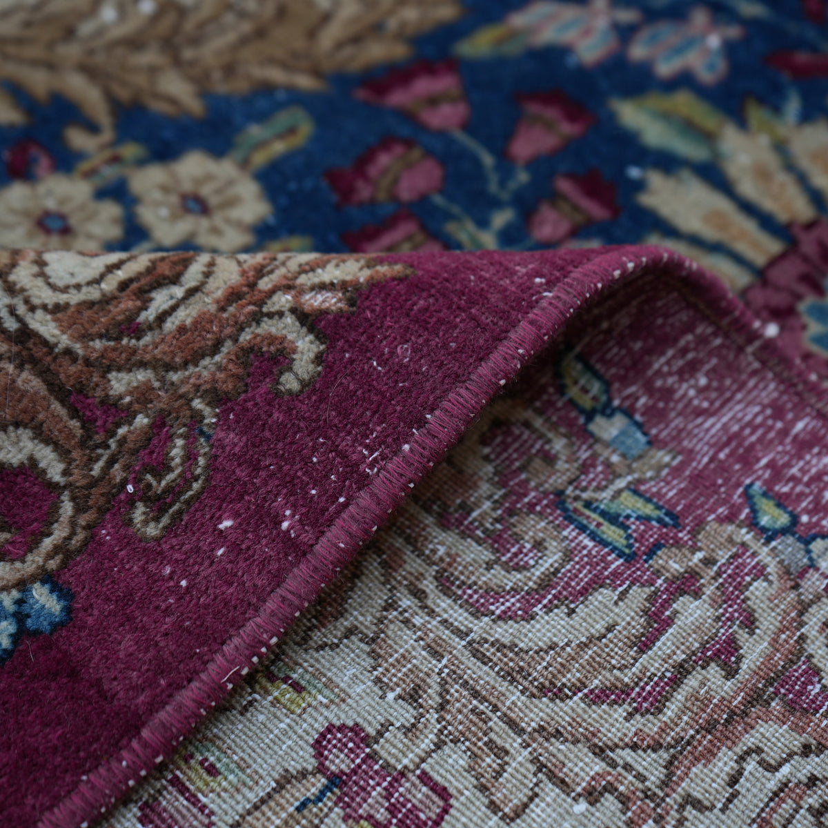 Colorful 10' x 14' vintage persian rug from the 1970s with traditional design.