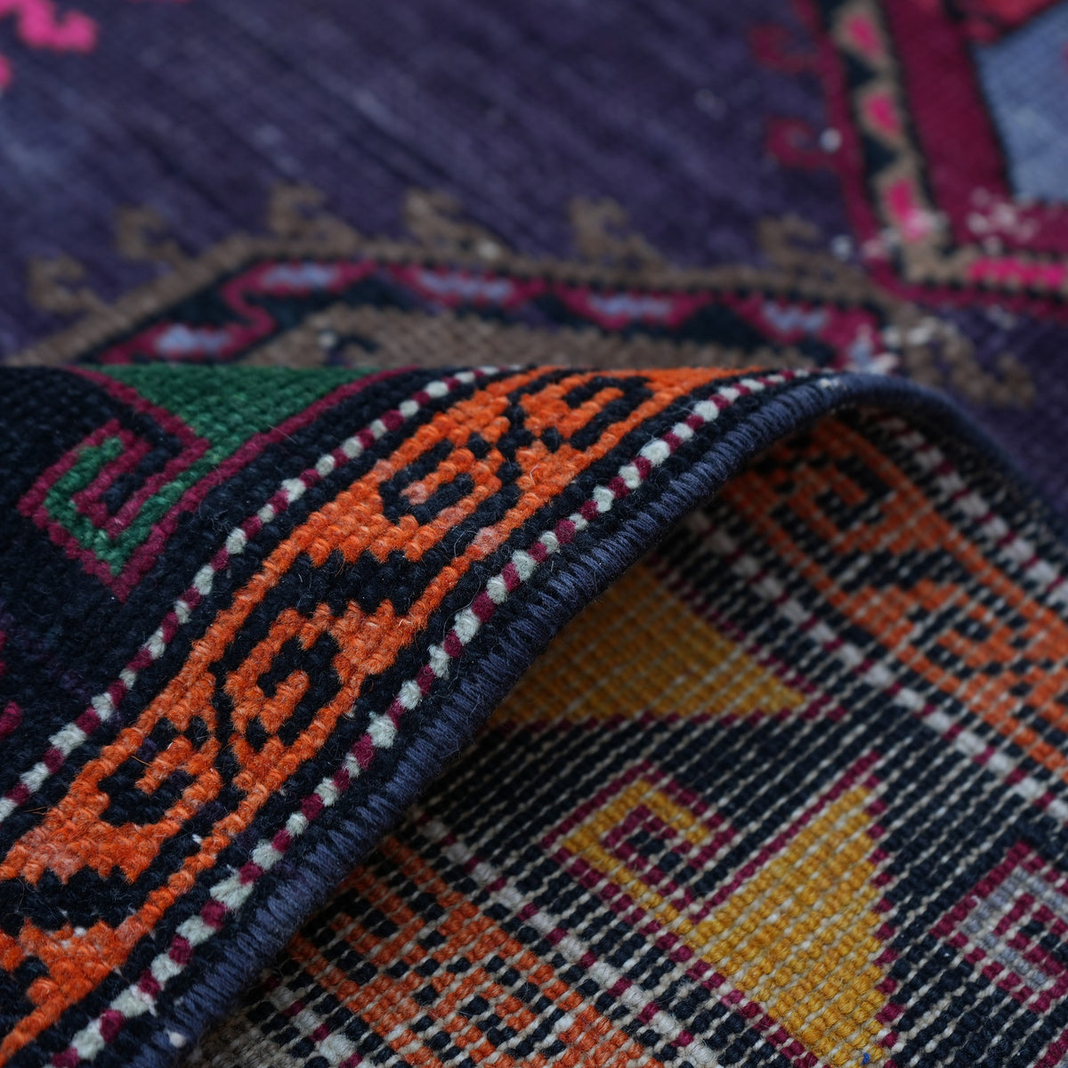 Additional view of the purple vintage Turkish persian rug, hand-knotted in wool and cotton.