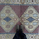 1970s red vintage Turkish persian rug with traditional design, hand-knotted weave and low pile.