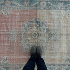 1970s red vintage Turkish persian rug with medallion design, hand-knotted weave and low pile.