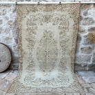 Beige 6' x 9' vintage persian rug with neutral design, handmade in Turkey – Cleavon.