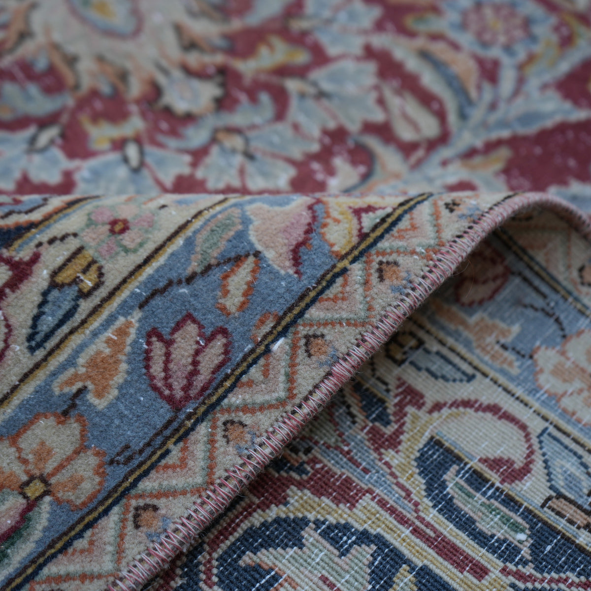 Additional view of the red vintage persian rug in wool and cotton.