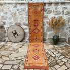Orange 2' x 12' vintage persian runner rug with traditional design, handmade in Persian – Moe.