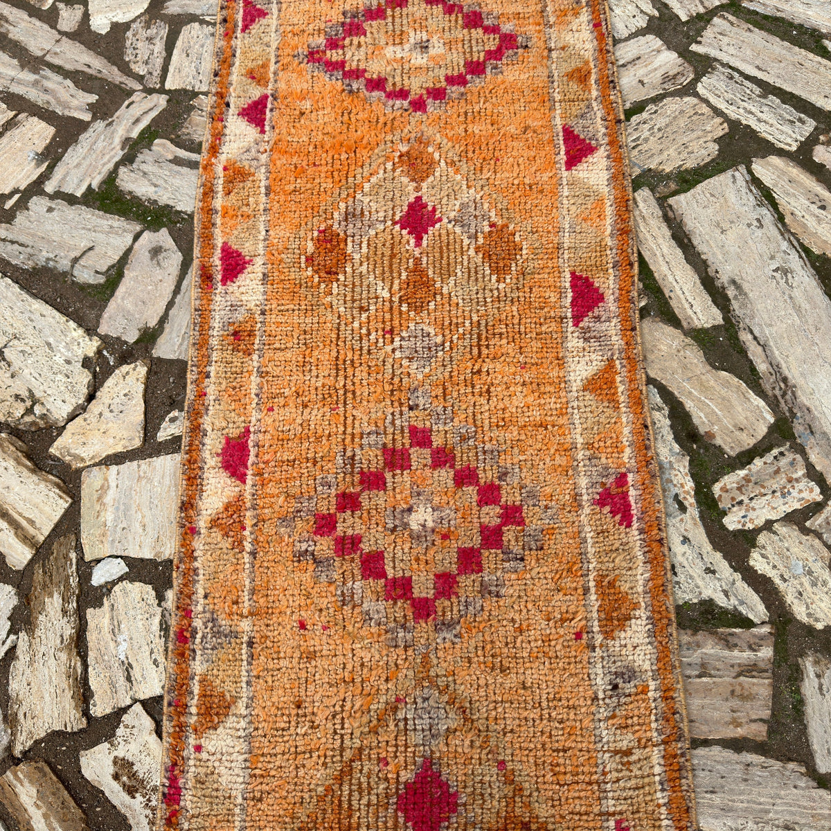 1970s orange vintage persian runner rug with traditional design, hand-knotted weave and medium pile.