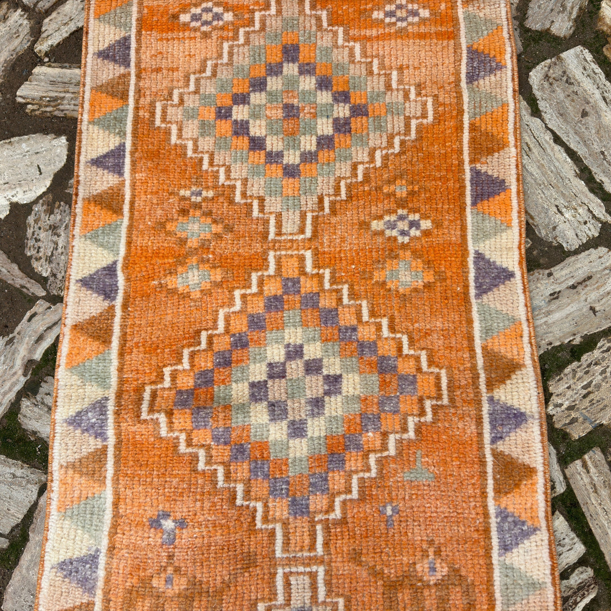 1970s orange vintage persian runner rug with traditional design, hand-knotted weave and medium pile.