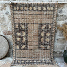 Brown 5' x 8' vintage persian style rug with geometric design, handmade in Turkey – Byram.
