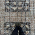 1970s brown vintage Turkish persian style rug with geometric design, hand-knotted weave and low pile.