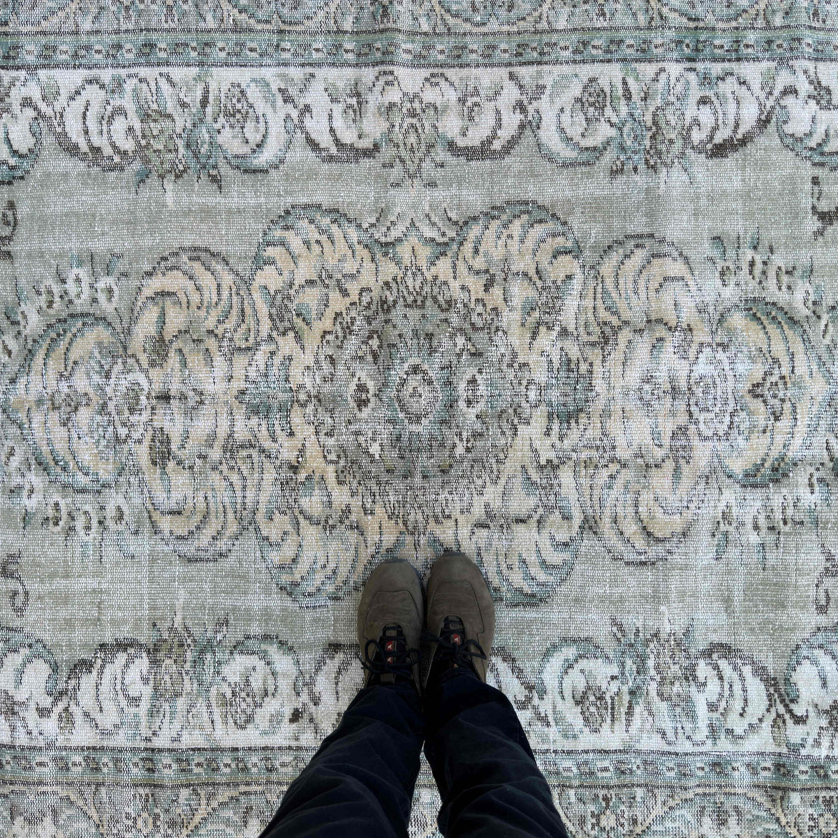 1970s green vintage Turkish persian style rug with geometric design, hand-knotted weave and low pile.