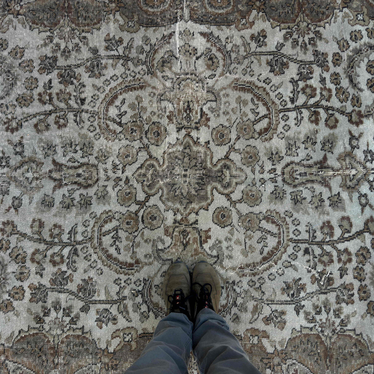 1970s brown vintage Turkish persian style rug with geometric design, hand-knotted weave and low pile.