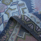 Additional view of the pink vintage Turkish rug, hand-knotted in wool and cotton.