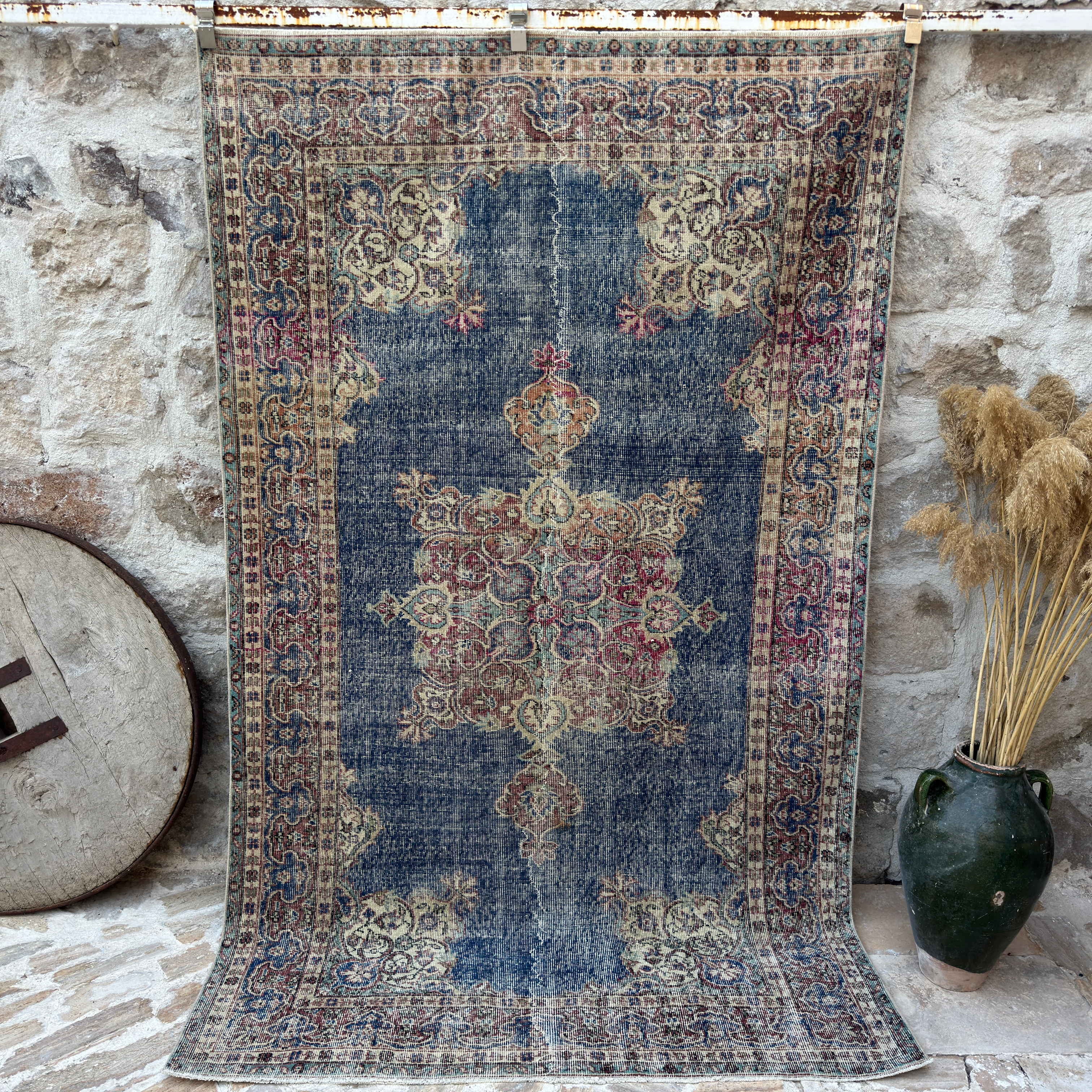 Blue 5' x 8' vintage rug with medallion design, handmade in Turkey – Grazia.