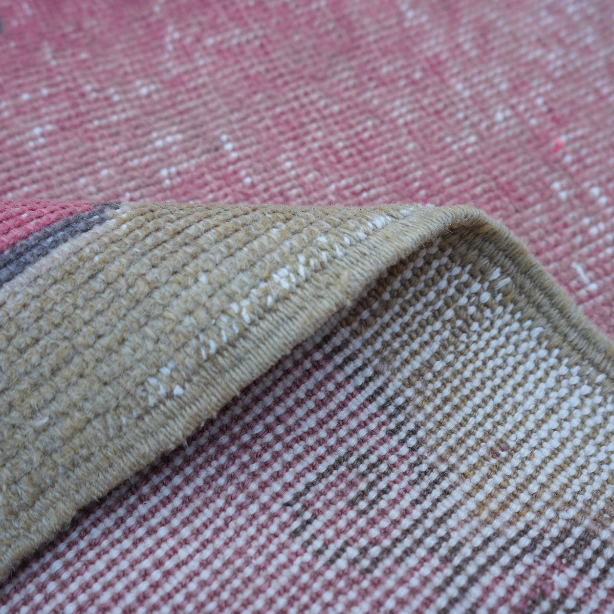 Additional view of the pink vintage Turkish runner rug, hand-knotted in wool and cotton.