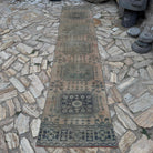 Beige 3' x 11' vintage Turkish runner rug in wool and cotton, shown on the floor.