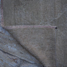 1970s beige vintage Turkish runner rug with neutral design, hand-knotted weave and low pile.