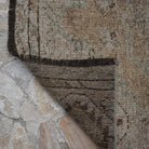 1970s beige vintage Turkish runner rug with neutral design, hand-knotted weave and low pile.