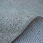 Additional view of the pink vintage Turkish runner rug, hand-knotted in wool and cotton.