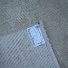 Pink 3' x 9' vintage Turkish runner rug from the 1970s with traditional design.