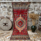 Red 4' x 10' vintage runner rug with traditional design, handmade in Turkey – Crystie.
