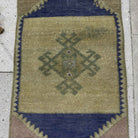 1970s blue vintage Turkish small rug with neutral design, hand-knotted weave and low pile.