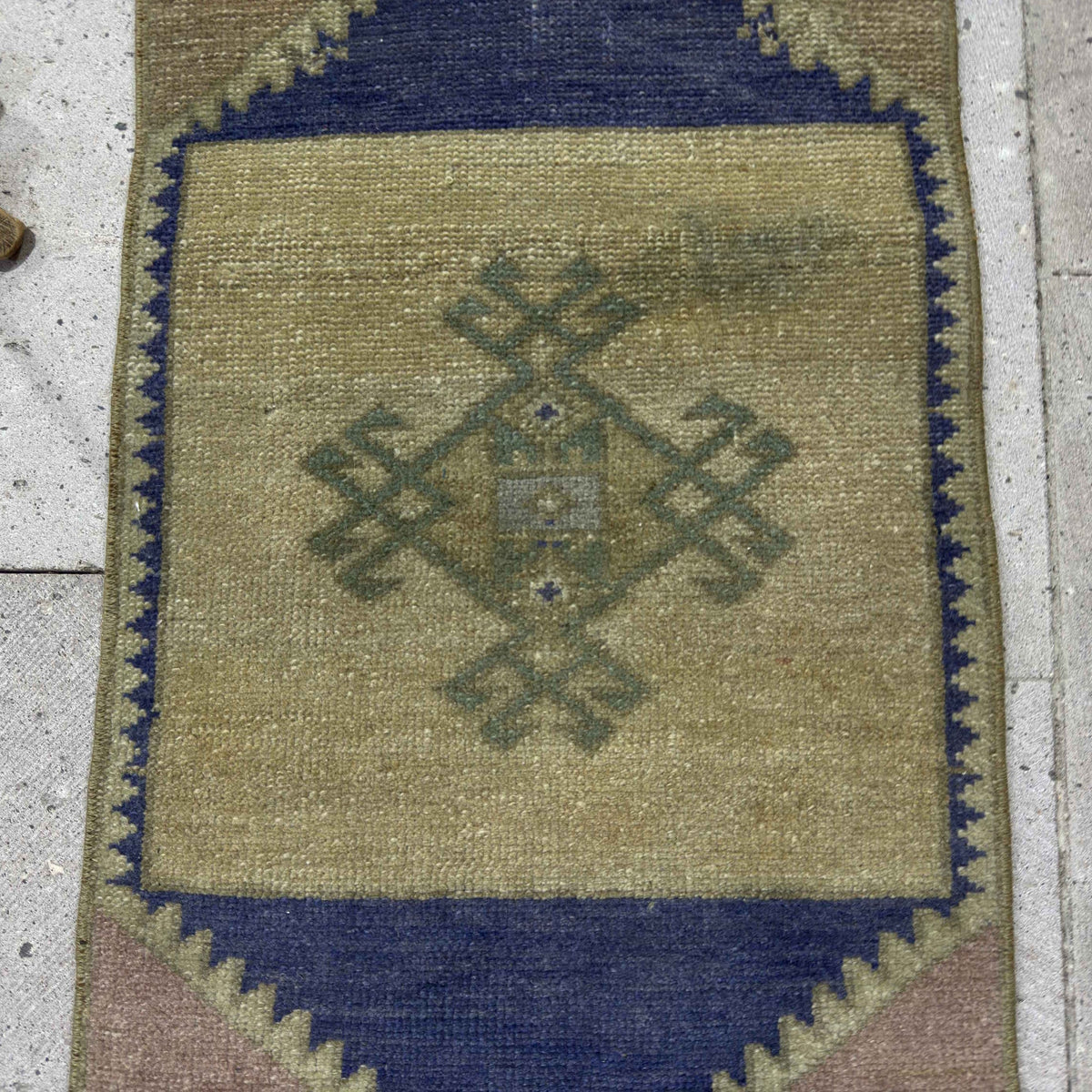 1970s blue vintage Turkish small rug with neutral design, hand-knotted weave and low pile.