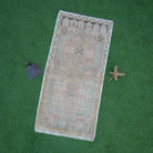Pink 2' x 3' vintage small rug with neutral design, handmade in Turkey – Reading.