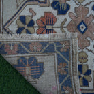 1970s blue vintage Turkish square rug with traditional design, hand-knotted weave and low pile.