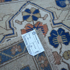 Blue 2' x 2' vintage Turkish square rug from the 1970s with traditional design.