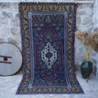 Blue 5' x 9' vintage tradiitonal rug with traditional design, handmade in Turkey – Alecia.