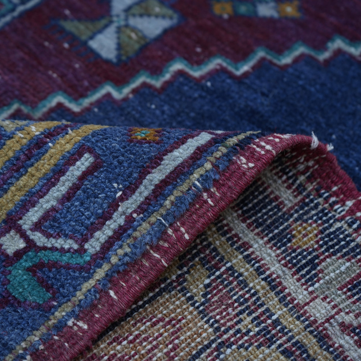 Additional view of the blue vintage Turkish tradiitonal rug, hand-knotted in wool and cotton.