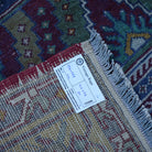 Blue 5' x 9' vintage Turkish tradiitonal rug from the 1970s with traditional design.