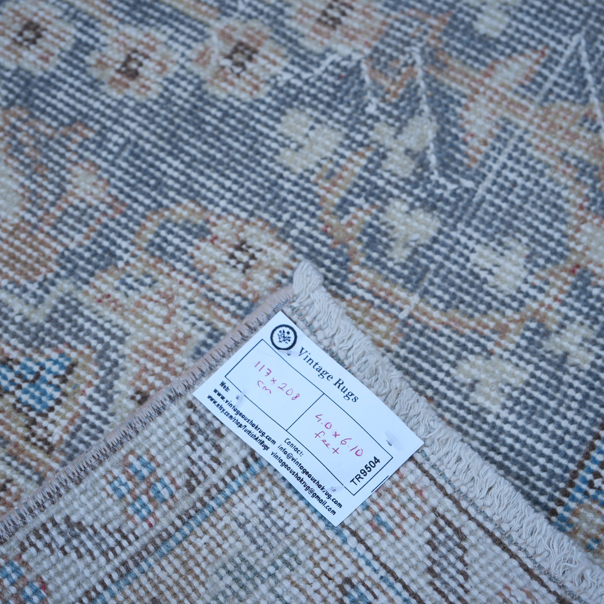 Purple 4' x 7' vintage Turkish traditional rug from the 1970s with traditional design.
