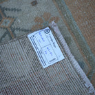 Orange 4' x 8' vintage Turkish traditional rug from the 1970s with traditional design.