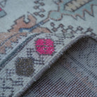 Additional view of the orange vintage Turkish traditional rug, hand-knotted in wool and cotton.