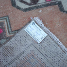 Orange 4' x 8' vintage Turkish traditional rug from the 1970s with traditional design.