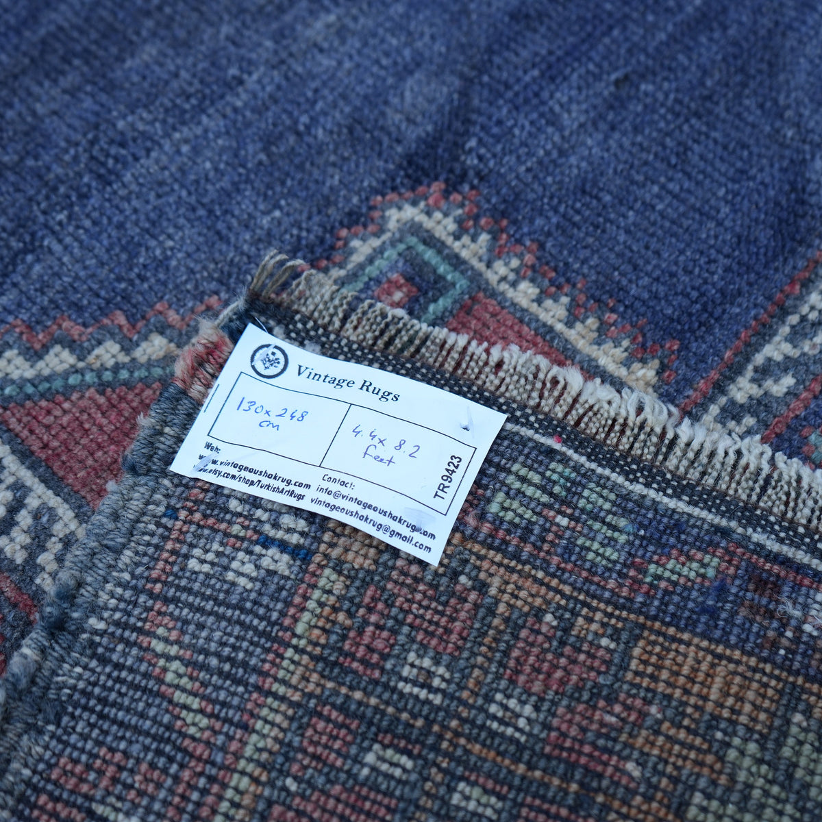 Red 4' x 8' vintage Turkish traditional rug from the 1970s with medallion design.