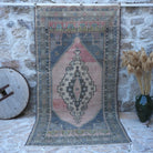 Pink 5' x 10' vintage traditional rug with traditional design, handmade in Turkey – Ronda.