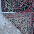 1970s red vintage Turkish traditional rug with traditional design, hand-knotted weave and low pile.