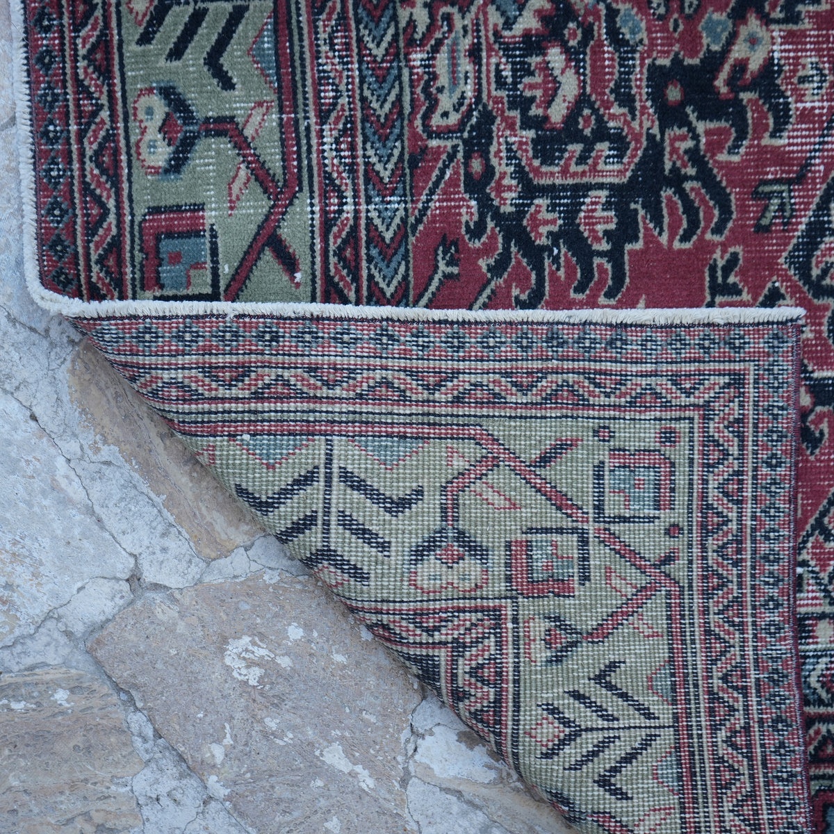 1970s red vintage Turkish traditional rug with traditional design, hand-knotted weave and low pile.