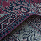 Additional view of the red vintage Turkish traditional rug, hand-knotted in wool and cotton.