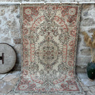 Pale Red 5' x 9' vintage traditional rug with medallion design, handmade in Turkey – Eleanor.