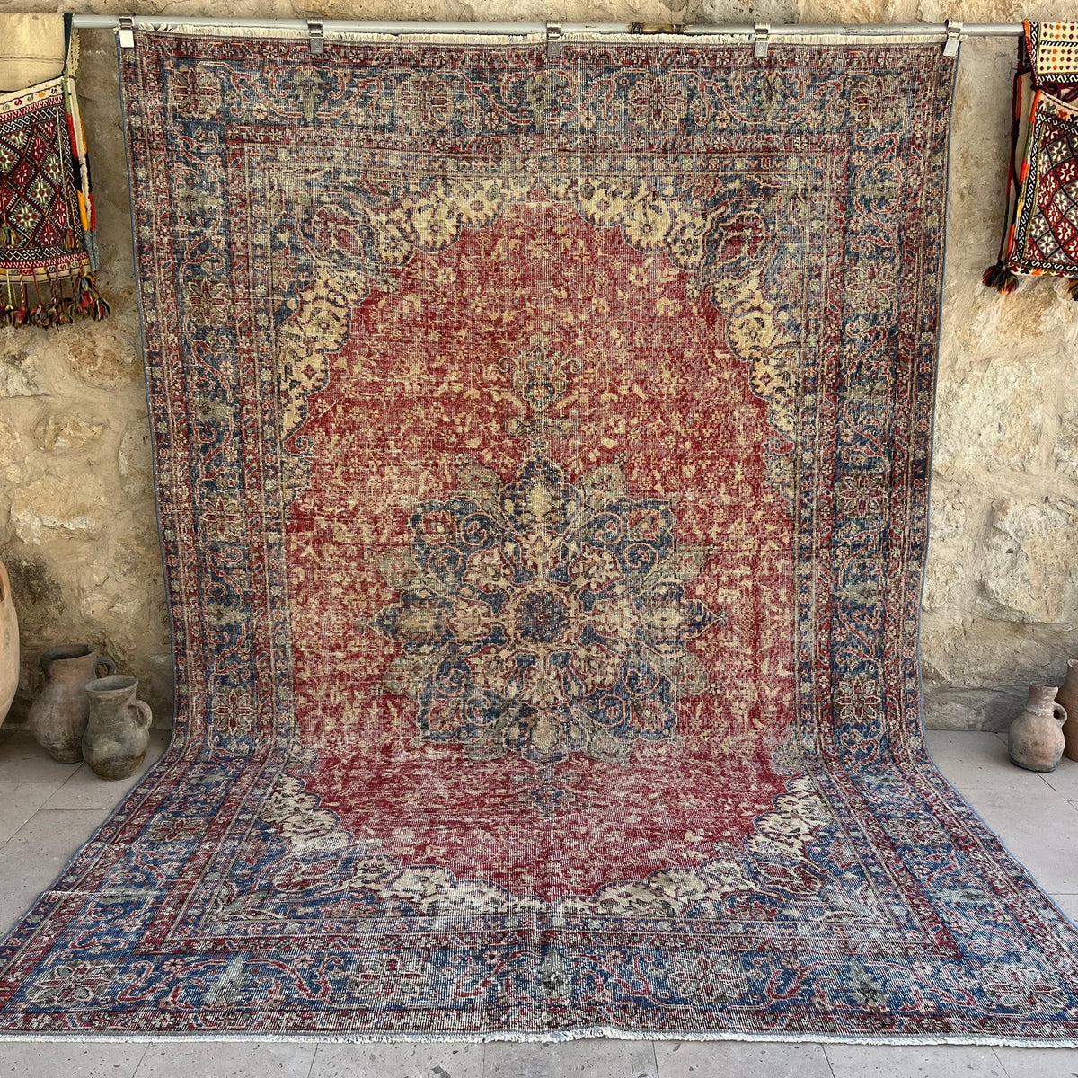Red 7' x 10' vintage traditional rug with medallion design, handmade in Turkey – Radburn.