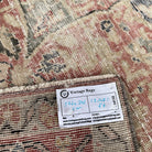 1970s pale red vintage Turkish traditional rug with medallion design, hand-knotted weave and low pile.