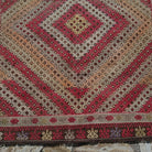 1970s brown vintage Turkish tribal kilim rug with geometric design, flatweave construction and low pile.