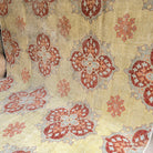 Yellow 10' x 12' vintage turkish area rug in wool and cotton, shown on the floor.