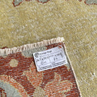 1970s yellow vintage turkish area rug with floral design, hand-knotted weave and low pile.