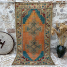 Orange 4' x 8' vintage turkish carpet with medallion design, handmade in Turkey – Donelle.